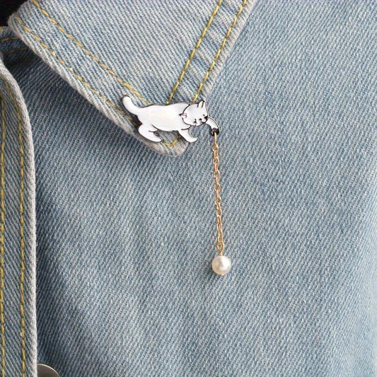 🐱✨ Playful Cat with Pearl Dangle Pin